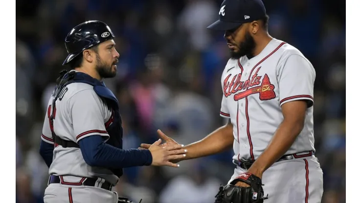 Travis d'Arnaud (left) and Kenley Jansen of Atlanta Braves