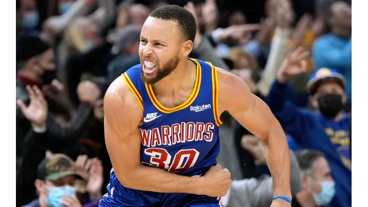 Stephen Curry of the Golden State Warriors reacts after making a three-point shot against the Memphis Grizzlies