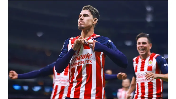 Cristian Calderon of Chivas celebrates after scoring