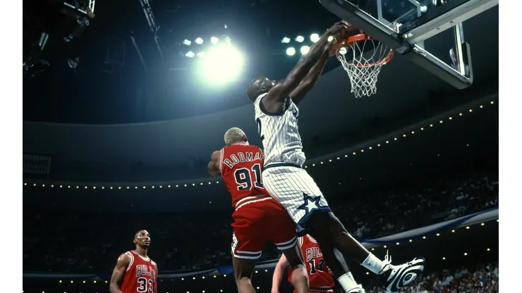 Shaquille O'Neal dunking on Dennis Rodman