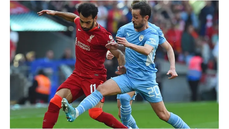 Mohamed Salah of Liverpool with Bernardo Silva of Manchester City