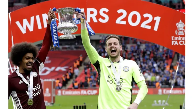 Leicester City's Hamza Choudhury and goalkeeper Danny Ward celebrate with the trophy