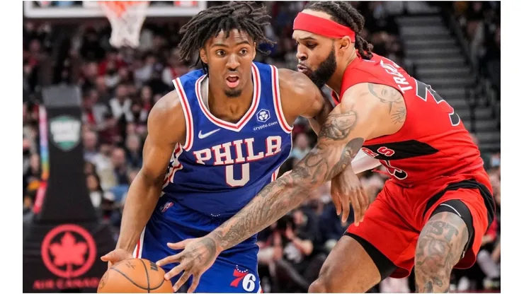 Tyrese Maxey of the Philadelphia 76ers drives against Gary Trent Jr. of the Toronto Raptors