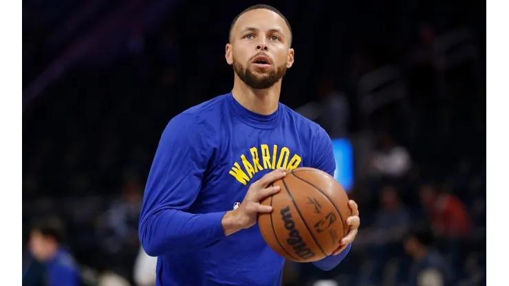 Stephen Curry of the Golden State Warriors warms up before the game against the Boston Celtics at Chase Center