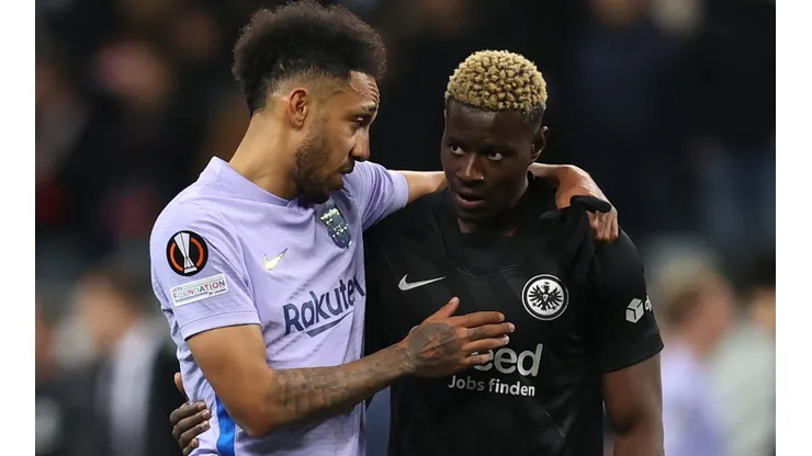 Pierre-Emerick Aubameyang of Barcelona and Ragnar Ache of Eintracht Frankfurt