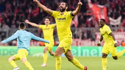 Raúl Albiol of Villarreal celebrates with his teammates after Villarreal qualify for the Champions League Semifinals