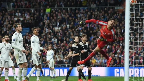 Real Madrid's Thibaut Courtois receiving a goal against Ajax in UEFA Champions League 2018-2019