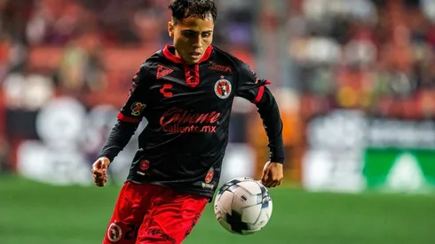 Misael Dominguez of Tijuana controls the ball during the 9th round match between Club Tijuana and Atletico San Luis