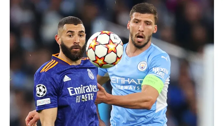 Karim Benzema of Real Madrid (left) and Ruben Dias of Manchester City.