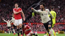 Mohamed Salah of Liverpool celebrates after scoring their side's third goal during the Premier League match between Manchester United and Liverpool