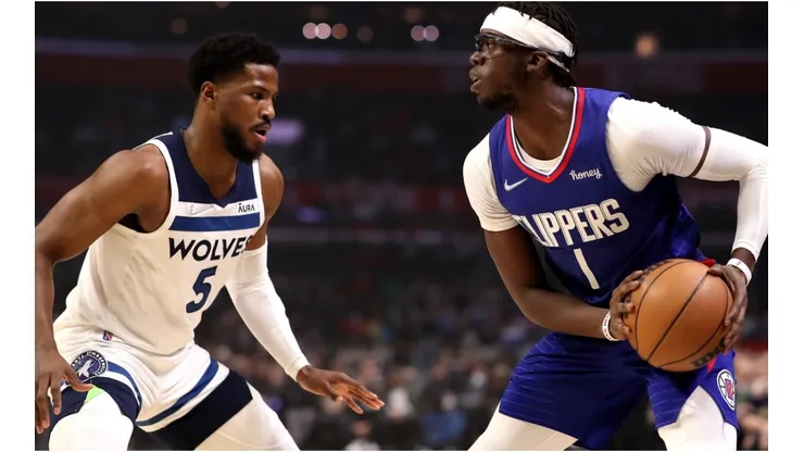 Reggie Jackson of the Los Angeles Clippers handles the ball against Malik Beasleyof the Minnesota Timberwolves