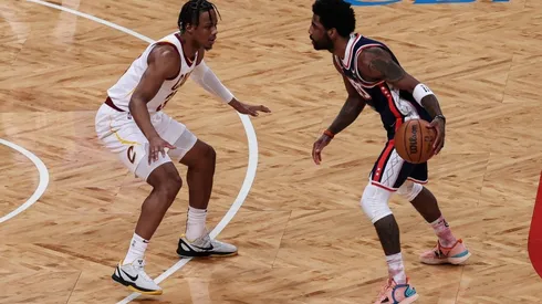 Kyrie Irving of Brooklyn Nets and Isaac Okoro of Cleveland Cavaliers
