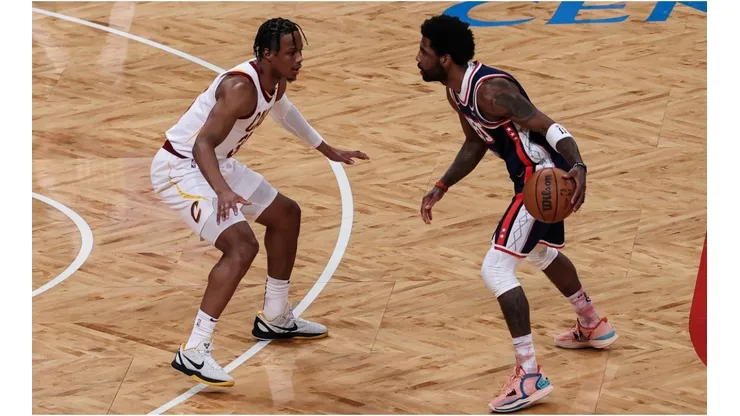 Kyrie Irving of Brooklyn Nets and Isaac Okoro of Cleveland Cavaliers