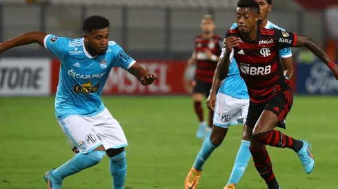 Johan Madrid of Sporting Cristal fights for the ball