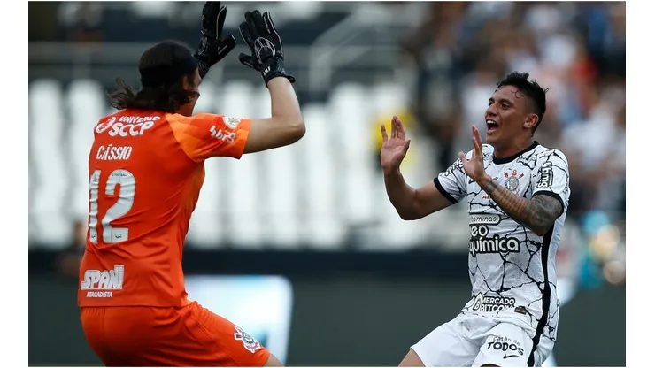 Gustavo Mantuan of Corinthians celebrates with teammate Cássio after scoring
