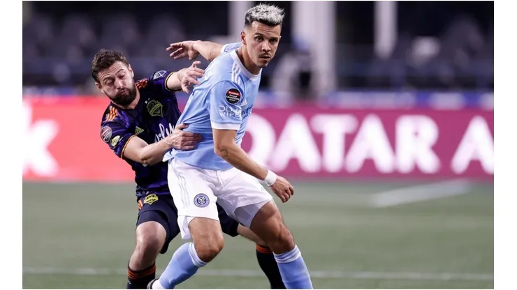 João Paulo of Seattle Sounders defends Alfredo Morales of New York City