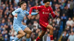 Manchester City's Jack Grealish (left) and Liverpool's Trent Alexander-Arnold battle for the ball