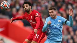 Mohamed Salah of Liverpool and Aymeric Laporte of Manchester City