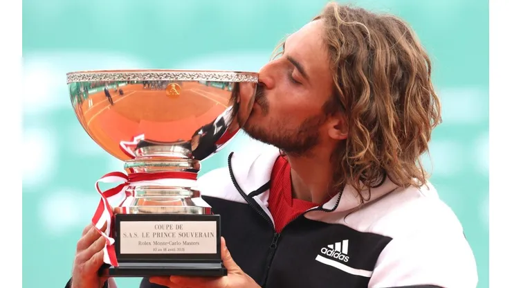 Stefanos Tsitsipas kissing the trophy of 2021 Monte-Carlo Master
