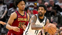 Isaac Okoro of the Cleveland Cavaliers and Kyrie Irving of the Brooklyn Nets