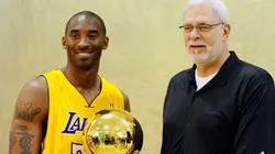 Kobe Bryant and Phil Jackson pose with NBA Finals Larry O'Brien Championship Trophy.
