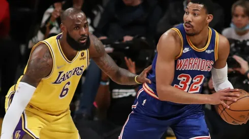 LeBron James of the Los Angeles Lakers and Otto Porter Jr. of the Golden State Warriors