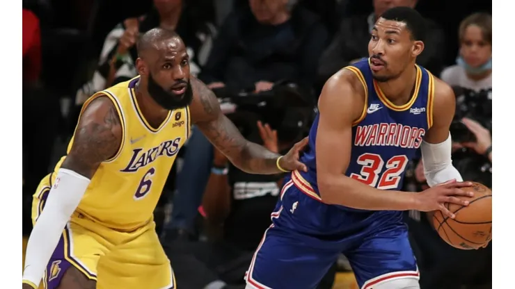 LeBron James of the Los Angeles Lakers and Otto Porter Jr. of the Golden State Warriors