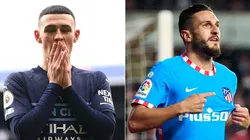 Phil Foden of Manchester City and Koke of Atletico de Madrid