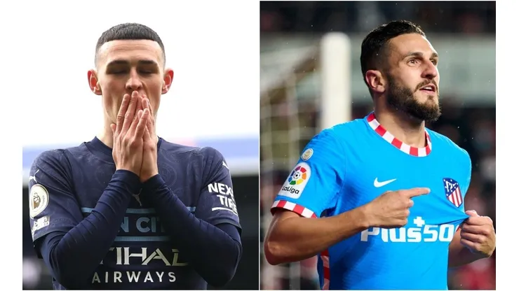 Phil Foden of Manchester City and Koke of Atletico de Madrid