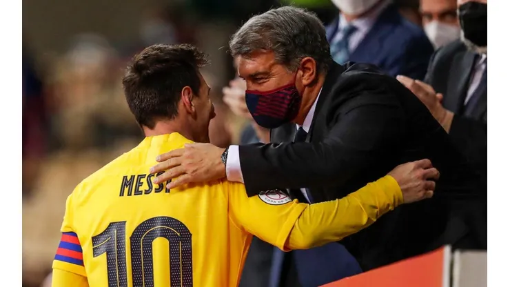 Lionel Messi and Joan Laporta of Barcelona