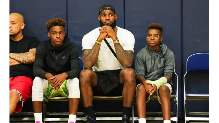 Bronny James (left), LeBron James (middle), and Bryce Maximus James