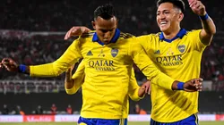 Sebastián Villa and Luis Vázquez celebrating a goal.