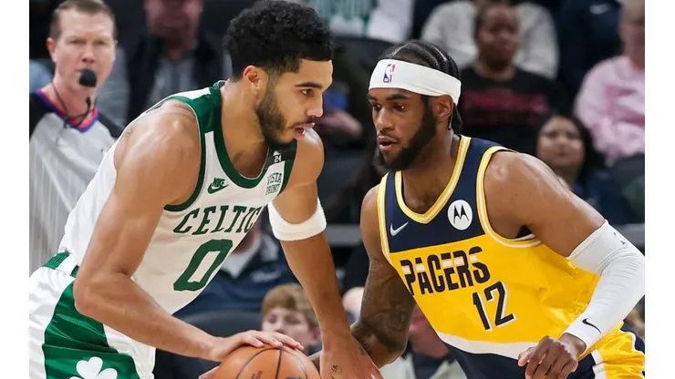 Jayson Tatum of the Boston Celtics and Oshae Brissett of the Indiana Pacers