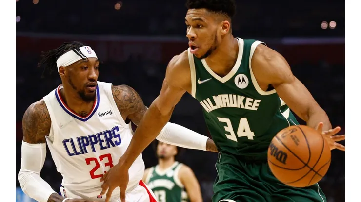 Giannis Antetokounmpo of the Milwaukee Bucks and Robert Covington of the Los Angeles Clippers