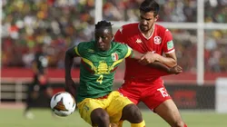 Mohamed Ali Ben Romdhane (R) of Tunisia in action against Amadou Haidara (L) of Mali