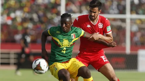 Mohamed Ali Ben Romdhane (R) of Tunisia in action against Amadou Haidara (L) of Mali