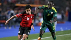 Omar Gaber of Egypt and Sade Mane of Senegal compete for the ball during the FIFA World Cup Qatar 2022 qualification