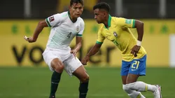 Rodrygo of Brazil fights for the ball with José Sagredo of Bolivia