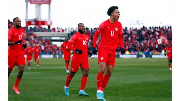 Taj Buchanan celebrates his goal as Canada beat Jamaica to qualify for Qatar 2022.