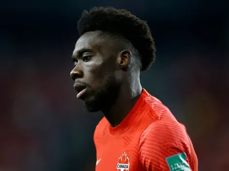 Why is Alphonso Davies not playing for Canada in the last 2022 World Cup Qualifiers games?