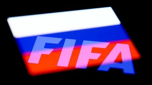 FIFA logo displayed on a phone screen and Russian flag displayed