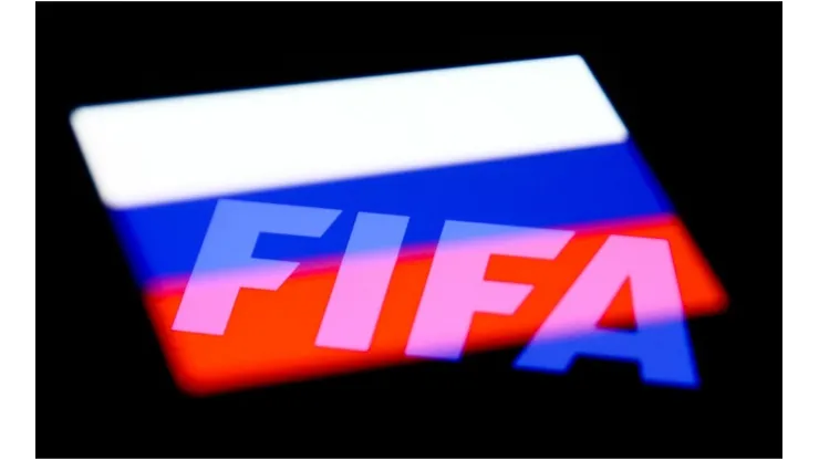 FIFA logo displayed on a phone screen and Russian flag displayed