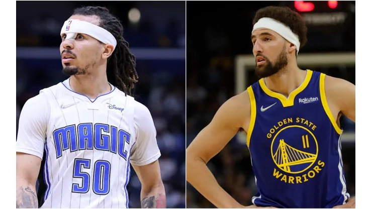 Cole Anthony of the Orlando Magic and Klay Thompson of Golden State Warriors