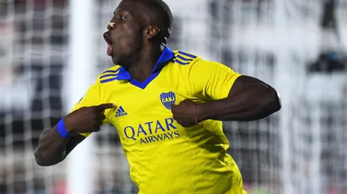 Boca Juniors are playing against River Plate with a yellow jersey.