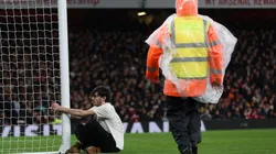 Man holds on to the post