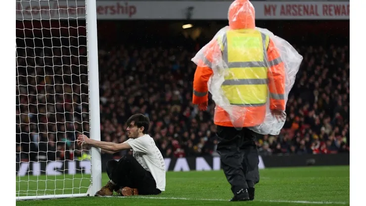 Man holds on to the post
