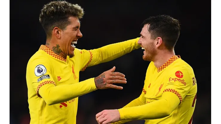 Roberto Firmino and Andy Robertson of Liverpool