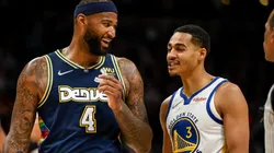 DeMarcus Cousins of the Denver Nuggets and Jordan Poole of the Golden State Warriors