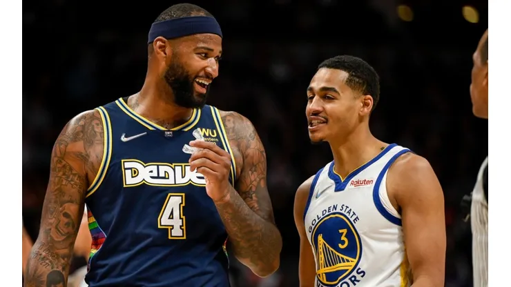 DeMarcus Cousins of the Denver Nuggets and Jordan Poole of the Golden State Warriors