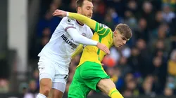 Christian Eriksen of Brentford and Brandon Williams of Norwich